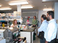 Scientists attending the Rust Diseases symposium are shown around laboratories at the Elizabeth Macarthur Agricultural Institute.